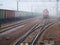 MOSCOW, NOV.07, 2018: View on old fashion railway electric locomotive on the rail tracks among freight trains in the autumn mornin