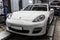 Moscow. November 2018. White Porsche. Panamera. on the background of a brick wall in the repair service. It should be on the stand