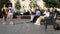 Moscow, people on the street sit on benches, relax, talk, on a summer day.