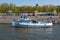 Moscow, Pleasure boat - a river tram takes place on the Moscow River in front of the Pushkin Embankment