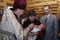Moscow region, Russia, 01.22.2019. The Holy Orthodox rite of the sacrament of baptism newborn baby in a Christian Church