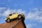 Moscow region, Russia - July 15, 2019: Old soviet car on a roof of a garage