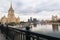 The Moscow River and its embankments. View from the Novoarbatskiy bridge. Famous skyscraper of the former Soviet hotel `Ukraine`.