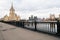 The Moscow River and its embankments. View from the Novoarbatskiy bridge. Famous skyscraper of the former Soviet hotel `Ukraine`.