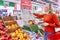 Moscow, Russia, 11/22/2018: A young woman weighs vegetables in a supermarket