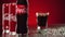 Moscow, Russia - 14 04 2020: Cinematic commercial shot of coca cola pouring in glass with ice cubes and rack focus on