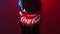 Moscow, Russia - 14 04 2020: Extreme close up cinematic footage of Coca Cola glass bottle classic with red and blue