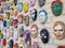 Moscow, Russia, 21 October 2019: Colorful painted ceramic faces sculpture on the bricks wall as an the object of modern