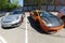Moscow, Russia - April 14, 2019:  Porsche 911 with aerography and Mansory tuning near bright orange Lamborghini Gallardo with