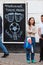 MOSCOW, RUSSIA - APRIL 30, 2018: People near the chalkboard on Solyansky proezd with the advertisement of football broadcasts