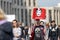 Moscow, Russia, April 30, 2018: Young man carries a red poster with the image of big brother at a action in support of the blocked