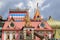 Moscow, Russia - August 06, 2018: Roofs of buildings of Izmailovo Kremlin on a background of cloudy blue sky closeup. Cultural and