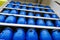 Moscow, Russia - August 17, 2019: Many large blue plastic barrels on the rack in a building materials hypermarket