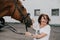 Moscow, Russia - August 2019: Horses and visitors to the equestrian base, horseback riding