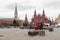 Moscow, Russia - August 24, 2020: Red Square, Nikolskaya Tower and Historical Museum. A black and red forklift transports the