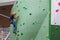 Moscow, Russia - August 30, 2016. Teen on climbing wall in shopping complex Zelenopark