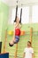 MOSCOW, RUSSIA-DEC 18, 2022: balance athlete boy champion strong gymnast male ring sport sportsman exercise health