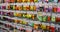 Moscow, Russia, December 2019: Close-up of a stand with paper bags with seeds of different varieties of annual flowers: marigold,