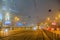 Moscow, Russia. December 26, 2019 A tram lit by a network of LEDs travels on rails in a foggy night. Environmentally friendly