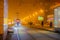 Moscow/Russia. December 26, 2019. Trams in the fog lit by a network of LEDs arrive at a bus stop with passengers. Environmentally