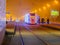 Moscow/Russia. December 26, 2019. Trams in the fog lit by a network of LEDs arrive at a bus stop with passengers. Environmentally