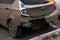 Moscow, Russia - December 29, 2019: Hyundai Solaris passenger car after a crash accident, a broken bumper and a crumpled car body