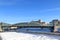 Moscow, Russia - February 14, 2019: Bogdan Khmelnitsky pedestrian bridge and snow-covered embankment