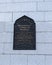 Moscow, Russia - February 2, 2020: A commemorative plaque on the facade of the Moscow Cathedral Mosque. A metal shield telling the