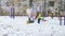 MOSCOW, RUSSIA - FEBRUARY 25, 2019: Worker of maintenance service removes snow using, operating a snowplow, snowblower street clea