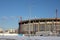 Moscow, Russia - February 8, 2020: Demolition of the building of the Olympic sports complex with construction cranes.