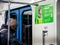 Moscow, Russia - February 8, 2020: A man rides in a subway car next to an Delivery Club advertisement. A young man stands at door