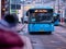 Moscow, Russia - January 17, 2020: The blue M27 bus pulls up to a public transport stop. City street with buses. On the LED