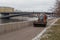 Moscow, Russia - January 7, 2020: Urban street cleaning from mud and snow, compact cleaning equipment on the streets. City