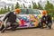 Moscow, Russia: July 06, 2019: Cosplay. Weasley brothers make magic painting on a tuned and lowrider volkswagen golf 7. Chip and