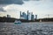 Moscow, Russia, July 2019: Sunset view of the skyscrapers of the Moscow city business center and the Moscow river steamers.