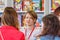 Moscow, Russia - June 02, 2019: Festival visitors and consultants of book publishers communicate on a background of stands with