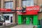 MOSCOW, RUSSIA - June 11, 2018: Workers dismantle a sign at the popular food store Pyaterochka.