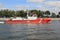 Moscow, Russia - June 14, 2018: Fire-fighting ship on the Moscow River and Luzhnetskaya Embankment