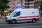 Moscow, Russia - June 16, 2019: White state ambulance minibus is moving along the wide and empty Moscow Avenue. Motion blur