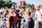 MOSCOW, RUSSIA - JUNE 2018: French fan in legionary soldier suit sword pierces a reporter in the fan zone during the World Cup