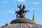 Moscow, Russia - June 28, 2018: Figure of George the Victorious on horseback closeup on dome of World Clock Fountain on Manezhnaya