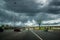 Moscow, Russia - June 5, 2015. Traffic on Leningrad highway against a stormy sky