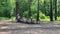 Moscow, Russia, June 9, 2020: older men play chess. Wooden benches and picnic tables are covered with red and white fencing tape.