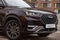 moscow, russia - march 18, 2020: close up of hood of new chineese flagship SUV chery tiggo 8 plus in city parking