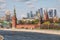 Moscow, Russia - May, 05, 2021: Kremlin Towers and Skyscrapers of Moscow City in spring. The contrast of Moscow architecture with