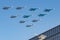 Moscow, Russia - May 07, 2019: Fighters Su-35S and Su-30SM with bombers Su-34 in the blue sky over Red Square in the group