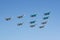 Moscow, Russia - May 07, 2019: Fighters Su-35S and Su-30SM with bombers Su-34 in the blue sky over Red Square in the group