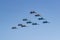 Moscow, Russia - May 07, 2019: Fighters Su-35S and Su-30SM with bombers Su-34 in the blue sky over Red Square in the group