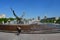 Moscow, Russia, May, 08, 2018. Woman makes selfie on the background of the fountain `Abduction of Europe` in Moscow on in clear da