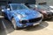 Moscow, Russia - May 09, 2019: Blue camouflage Porsche Cayenne parked on the street. Car is wrapped in colored protective film